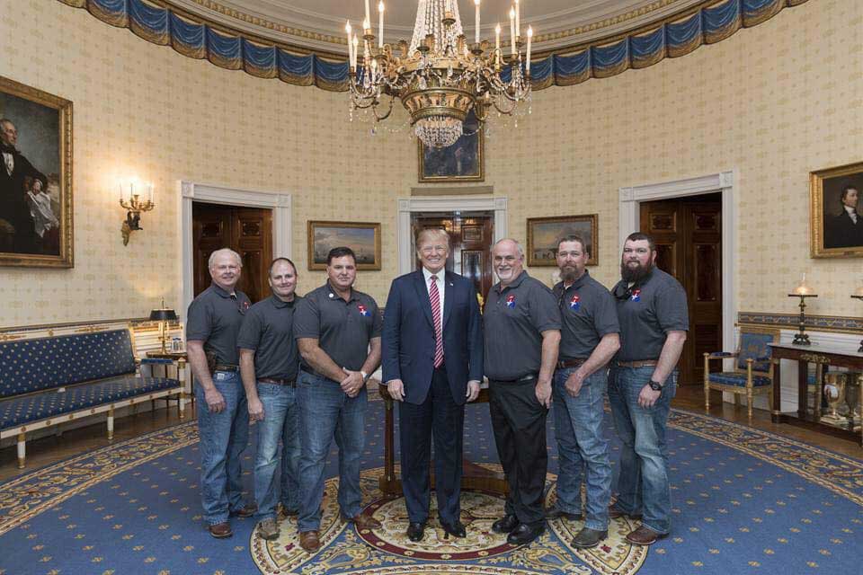 group of Pinnacle Search and Rescue leadership with president trump